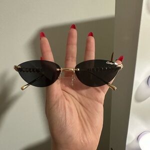 Elegant Gold and Black Sunglasses
